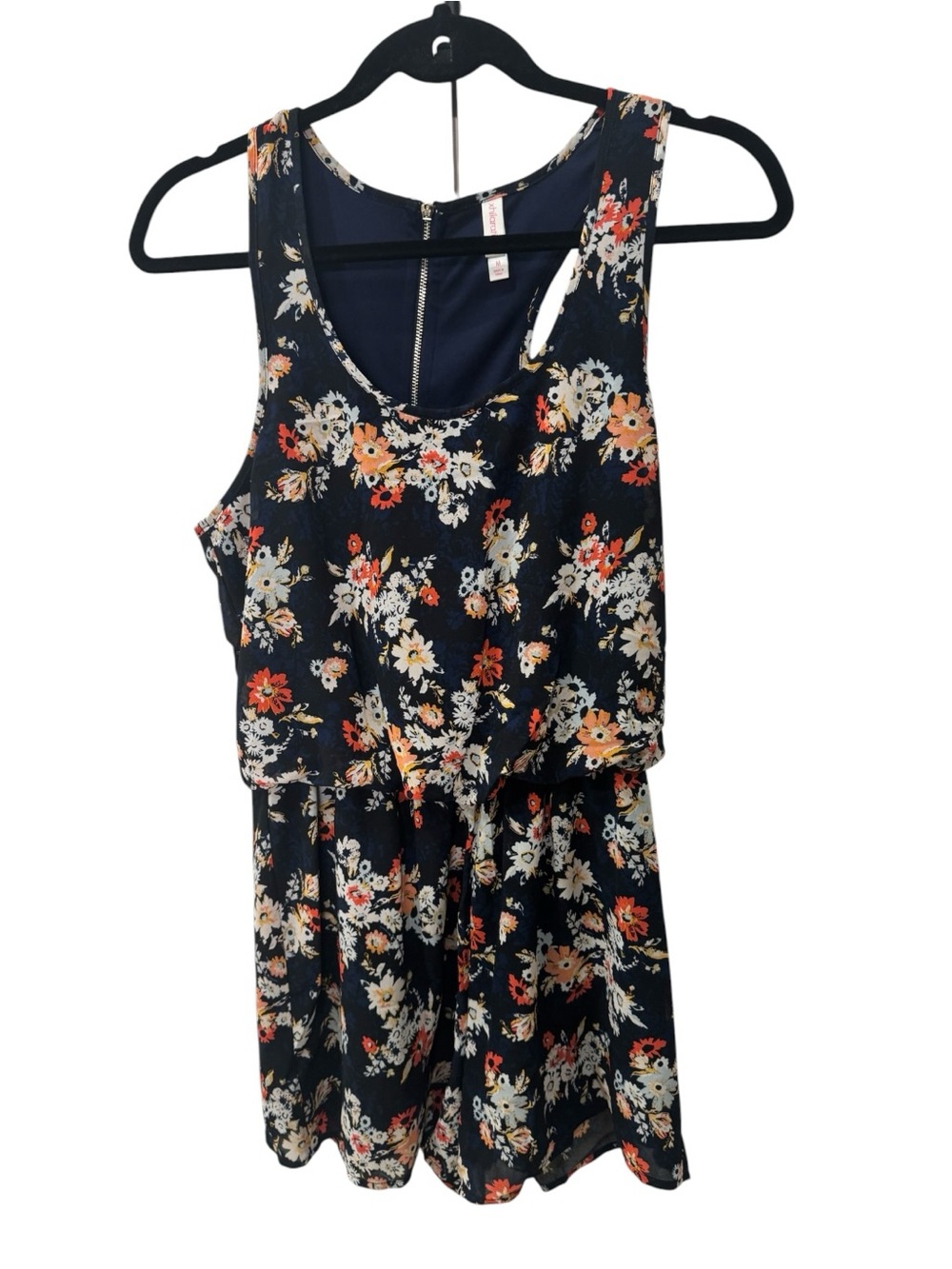 Xhilaration brand navy blue floral romper featuring a sleeveless design size M